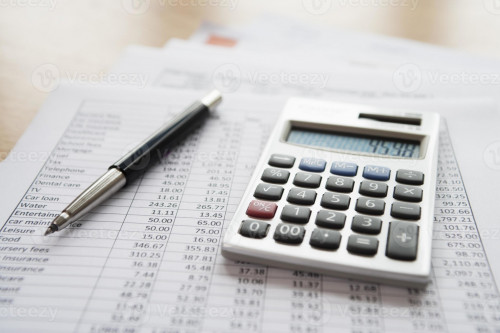 calculator-pen-on-personal-finance-documents-photo.jpg